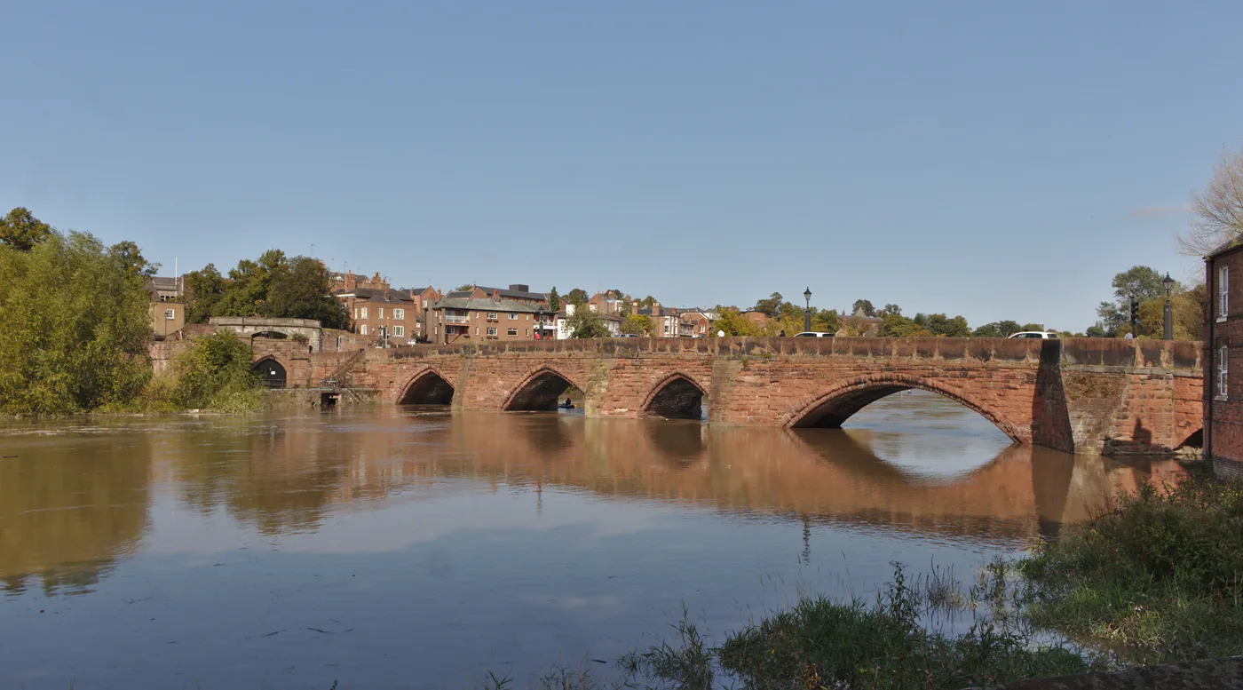 The Old Dee Bridge from the Handbridge bank, which the Santa Dash route has crossed since 2025.